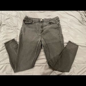 Black distressed skinny jeans.